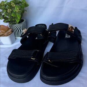 Steve Madden Black Sandals with Gold Accents